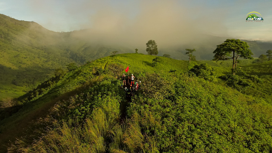 Runners check in at the volcano summit, nearly 1,000 meters above sea level download-40.jpg