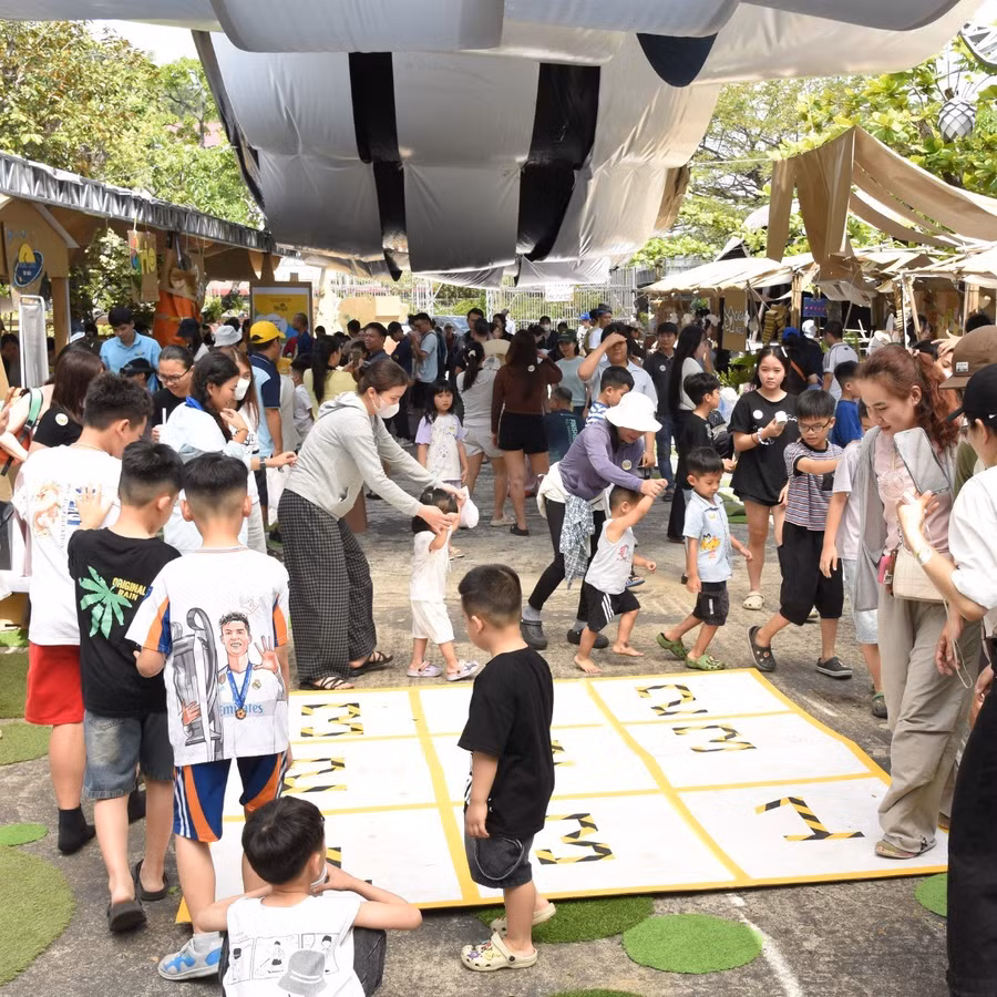Children join in group games at the event. Photo: Organizing Committee