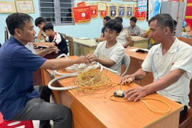 Despite their age and busy schedules working in the fields, many farmers still make time to learn trades such as electrical work and mechanics.