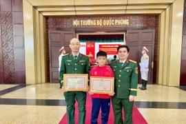 Young chess player Hoàng Tấn Vinh has been awarded a certificate of merit by the Ministry of National Defense in recognition of his outstanding achievements at the 33rd SEA Games and various international tournaments.