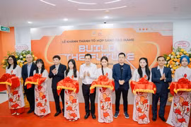 Delegates cut the ribbon at the inauguration of the iKame creative space complex.