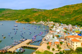 Hai Minh fishing village nestles at the foot of Phuong Mai Mountain.