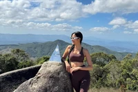 Miss Hoàng Thùy embarks on an eight-hour trek to conquer the summit of Chư Nâm Mountain