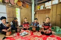 Artisans and local residents gather to play traditional musical instruments and sing folk songs during a community event. Photo: D.Đ