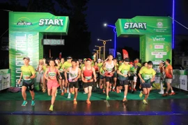 Despite the light rain, the athletes' passion for running remained undeterred. Photo: Hoang Hoai