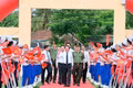Head of the Central Propaganda and Education Commission Trịnh Văn Quyết attends the All-People's Day for National Security Protection in Hoai Nhon Bac Ward