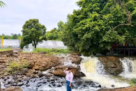 Enjoying the Beauty of Ba Waterfall