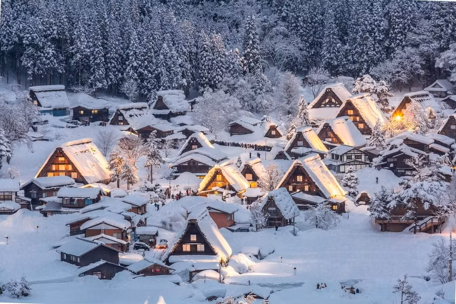 Shirakawa-go appears like a fairytale—steep thatched roofs rise above forested slopes, built to withstand heavy snow.