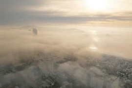 Quy Nhon’s coastal streets drape in enchanting morning fog
