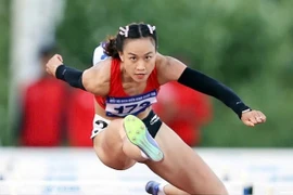 Huynh Thi My Tien wins a gold medal in the women's 100 m hurdles at the national athletics tournament at Hoa Xuan Stadium, Da Nang on Aug. 10, 2025. Photo by VnExpress/Duc Dong