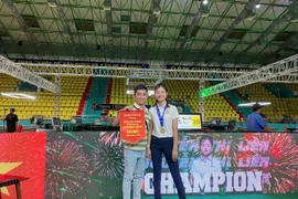 Nguyễn Lê Liên Quỳnh (right) is the only Vietnamese athlete participating in the Three-Cushion Carom Billiards World Championship.