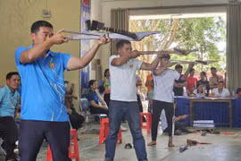 Gia Lai sports festival opens crossbow shooting, stilt racing and stick-pushing competitions