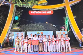 The organizing committee awarded first prize to the Phước Mỹ Taekwondo Club at the inaugural Martial Arts Dance Competition in 2026.