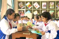 Students read books of their choice during an extracurricular session. Photo: Lam Nguyen