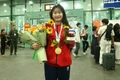 Welcoming athlete Nguyễn Thị Bích Thảo, who won the gold medal at the 33rd SEA Games.
