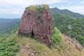 A Close-Up Look at the Solitary Cham Tower Atop Hon Chuong Peak