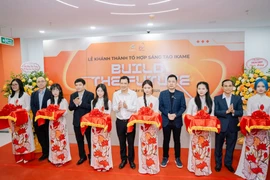Delegates cut the ribbon at the inauguration of the iKame creative space complex.