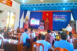 The scene at the launch ceremony of the AI assistant website for administrative procedures in Kông Bơ La commune.