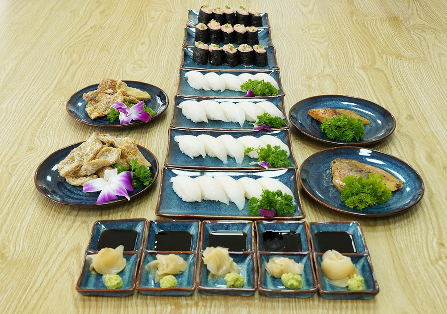 Sushi dishes made from red tilapia raised in Dinh Binh Lake. Photo: Viet Hung