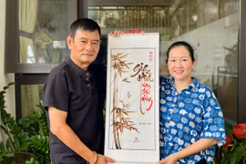 Gia Lai calligraphy artists turn recycled coffee grounds into distinctive works of art